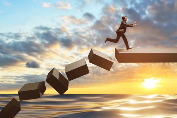 istock Businessman escape from danger at sunset sky 3d illustration 1592198191