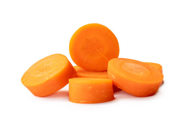 istock Fresh beautiful carrot slices isolated on white background witch clipping path Front view. 1592232001