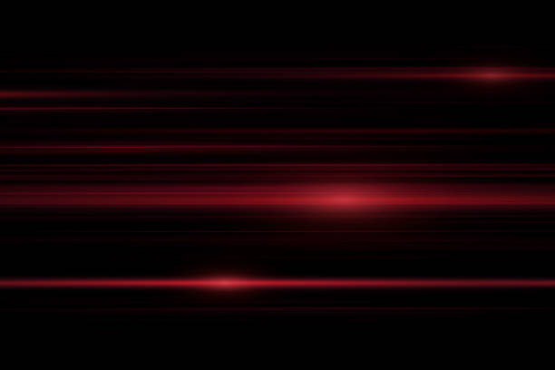 istock Glowing stripes. Beautiful flashes of light on a dark background. 1592232587