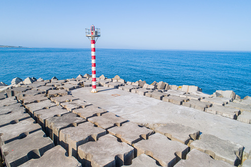 A breakwaters and harbor pier. Aerial view from drone.