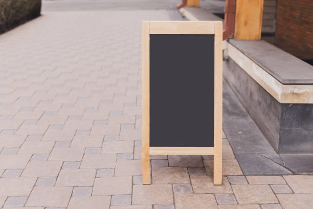 istock Special menu announcement board. Chalkboard stand for menu restaurant and cafe welcome easel with copy space and clipping path mock-up 1592248711