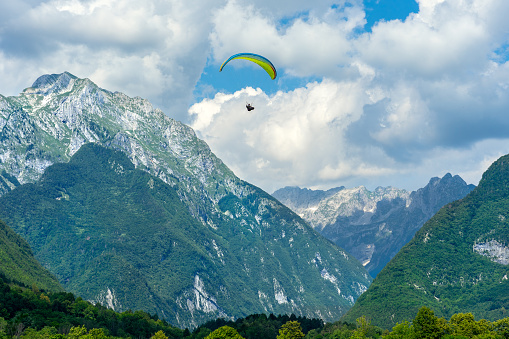 para gliding sky diving adventure in Bovec Slovenia between the mountains .