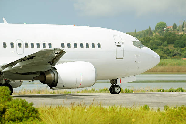 istock Passenger airplane waiting for takeoff clearance on the runway 159225716