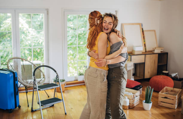 istock Happy couple hugging in new home 1592340247