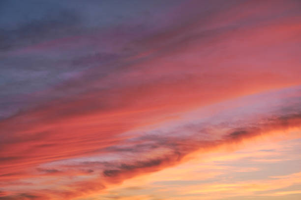 istock A sunset. Heaven, orange sky Sun rays Wallpaper 1592348707