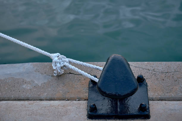 istock A bollard with a white rope tied to it from a harbour 1592349266