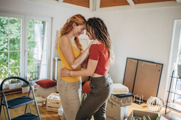 istock Happy couple in new home 1592354787