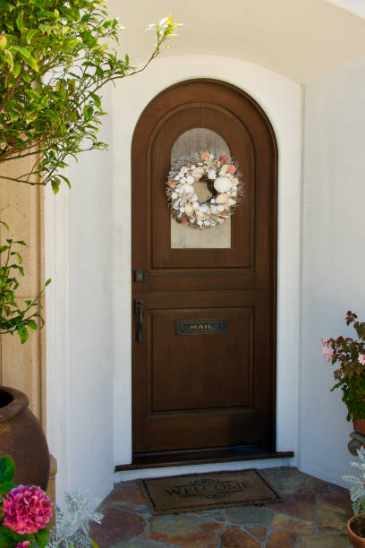 istock Mediterranean style arch front door to the villa 1592368171