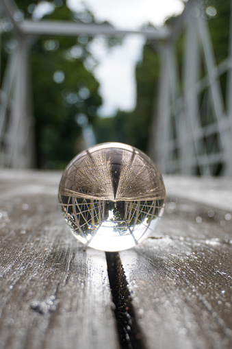 close-up of a crystal ball on a bridge