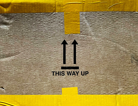 This way up on a cardboard box