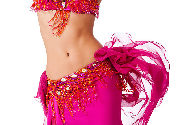 Belly Dancer in a Hot Pink Costume Shaking her Hips stock photo