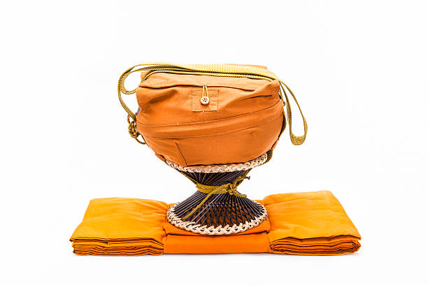 istock Alms bowl and robes of Monk. 159246542