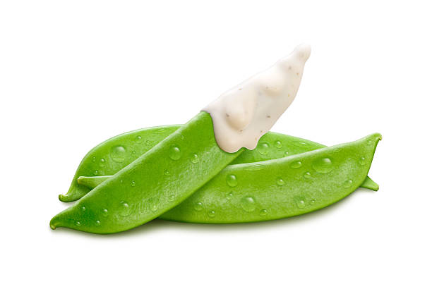 Pea Pods Isolated on white Pea Pods with Ranch dressing Isolated on a white background ranch dressing stock pictures, royalty-free photos & images