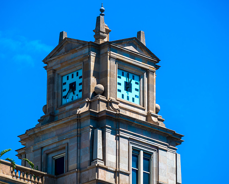 Barcelona, Spain - May 26 2022: Clock tower in the center of the city.