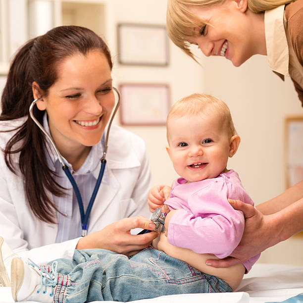 istock Pediatrician examine baby with stethoscope 159257395