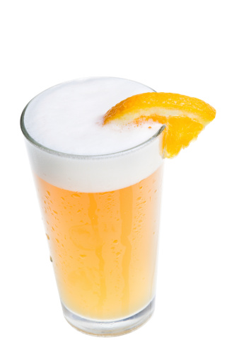 Microbrew Beer with Orange Slice isolated on white