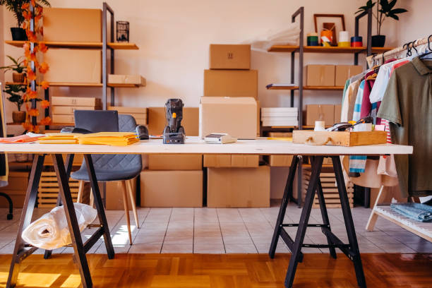 istock Picking and preparing clothes for delivery service 1592609720
