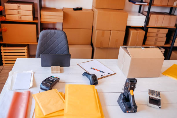 istock Picking and preparing clothes for delivery service 1592609722