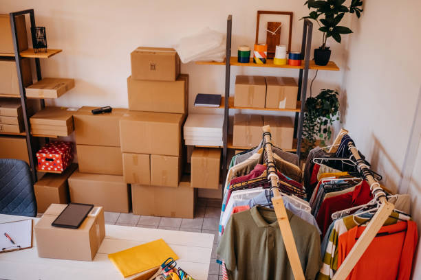 istock Picking and preparing clothes for delivery service 1592610238