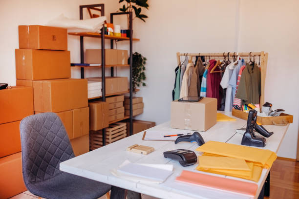 istock Picking and preparing clothes for delivery service 1592610240