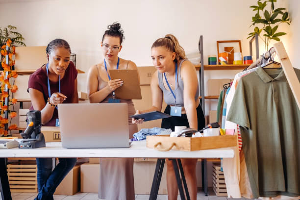 istock Young woman using laptop in her small business 1592611878