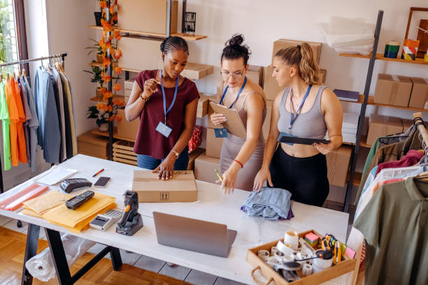 istock Young woman using laptop in her small business 1592612421