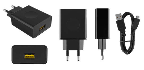 istock Power adapter for tablet laptop, on white background in insulation 1592657637