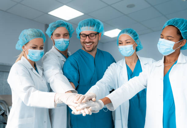 istock Team of surgeons ready for operation 1592700491