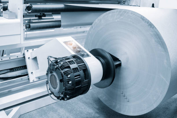 istock Printing and packaging from recycled paper rolls, industrial commercial envelope making machine, manufacture of corrugated paper and containers of paper and paperboard. 1592700517