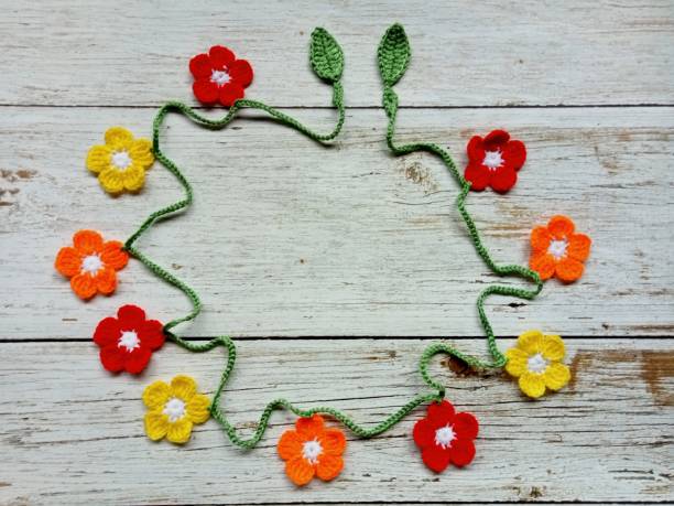 istock Crochet Pattern Fall Autumn Leaves Garland Bunting Handmade Background Texture 1592782388