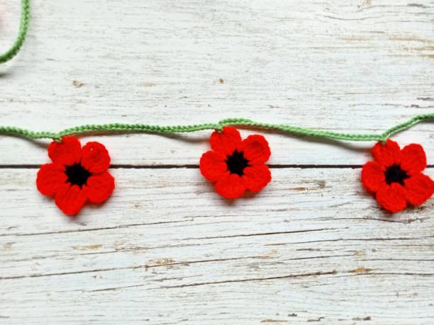 istock Crochet Pattern Fall Autumn Leaves Garland Bunting Handmade Background Texture 1592783417