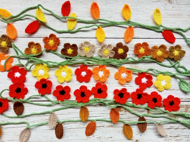 istock Crochet Pattern Fall Autumn Leaves Garland Bunting Handmade Background Texture 1592784999