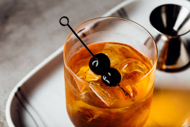 istock Booze Bourbon whiskey Manhattan Cocktail on the rocks 1592804597