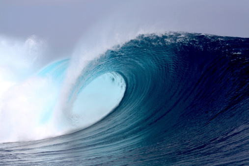 Tropical blue surfing wave Sumatra, Indonesia