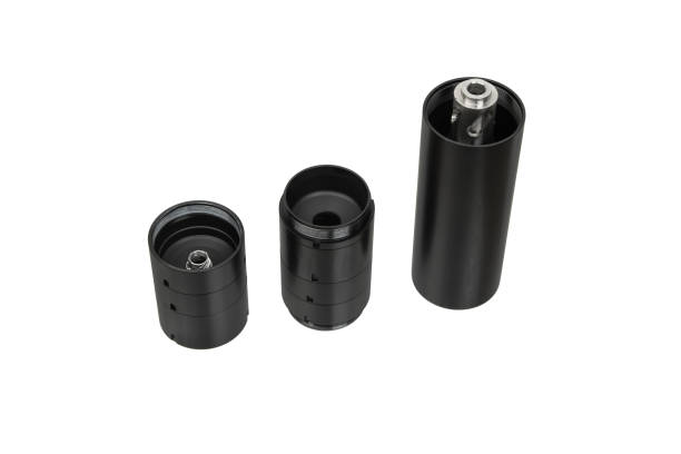 istock Black silencer for weapons. Suppressor that is at the end of an assault rifle. Isolate on a white background. 1592875466