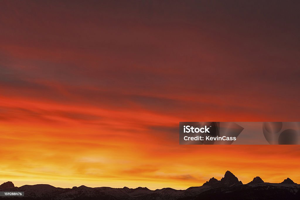 Cielo arancione Teton - Foto stock royalty-free di Alba - Crepuscolo