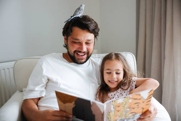 istock Father and daughter enjoying at home 1592959031