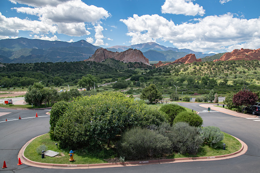 Garden of the Gods park with tall sandstone formations and Pikes Peak in Colorado Springs, Colorado in western USA of North America.