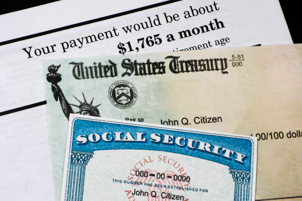 istock Corner of Social Security Administration annual statement with social secuiity check and ssn card. 1593071939