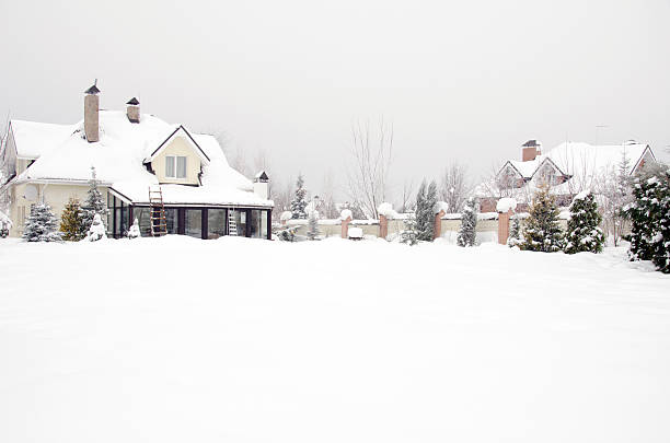 istock houses under snow in winter 159308940