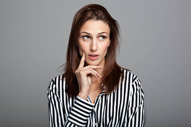 istock Young Businesswoman Thinking 159312133