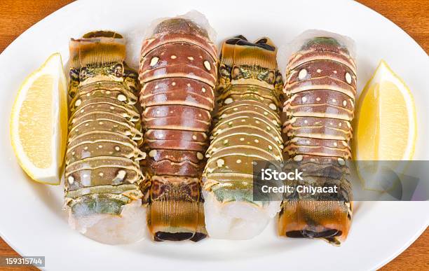 Coda Di Aragosta E Limone Zeppe - Fotografie stock e altre immagini di Agrume - Agrume, Aragosta - Frutto di mare, Coda