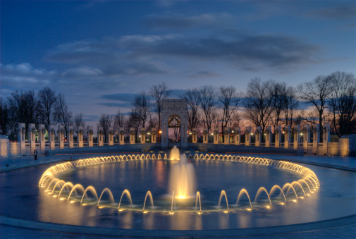 WWII Memorial at dusk showing the fountain and the Pacific side.