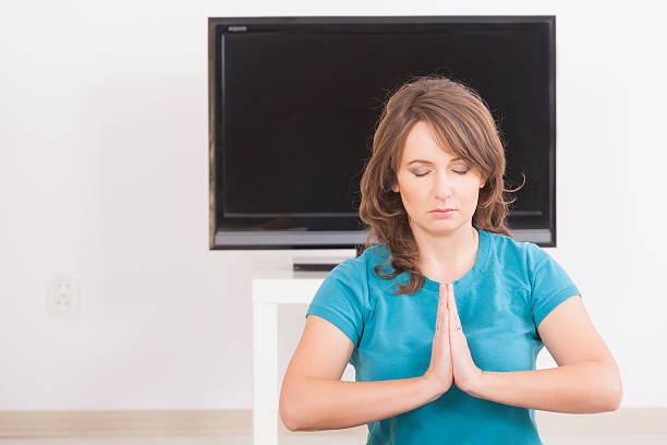istock Woman exercisng at home 159321819