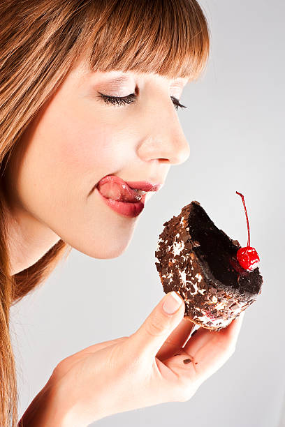 istock Beautiful brunette woman with a cake 159327091