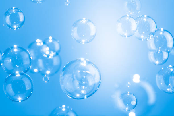 istock Beautiful Transparent Shiny Blue Soap Bubbles Floating in The Air. Abstract Background, Blue Textured, Celebration Festive Backdrop, Refreshing of Soap Suds, Bubbles Water. 1593300807