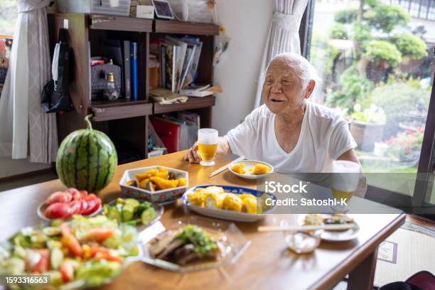 Senior Man Having Lunch At Home Stock Photo - Download Image Now - 80-89 Years, Active Seniors, Adult