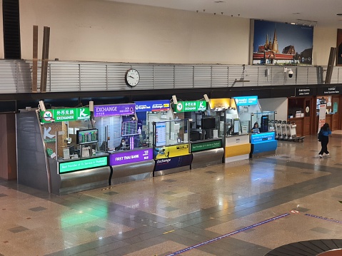 Bangkok, Thailand on July 9, 2023. Money Changers lined up at the Don Mueang International Airport. Kasikornthai, SCB First Thai Bank, Bangkok Bank, Krungsri and Krungthai Bank.