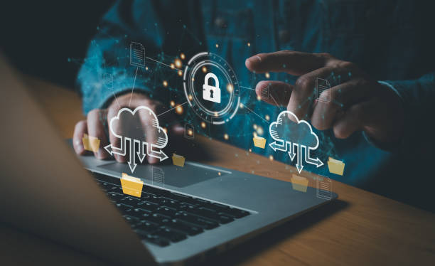 istock Business person migrate data and corporate information into cloud technology for data security and back up as disaster recovery site and prevent for cyber crime. Data inventory for enterprise. 1593337320