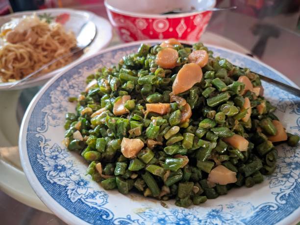 istock stir-fried green vegetables with chicken sausage 1593393611